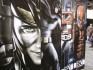 Phoenix Comicon 2013 - Scéna - D2 - 42 - Stánok s plagátmi superhrdinov 